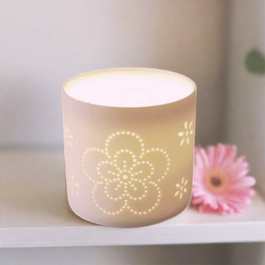 White Tealight Holder. With a pretty floral dot detail pattern, 