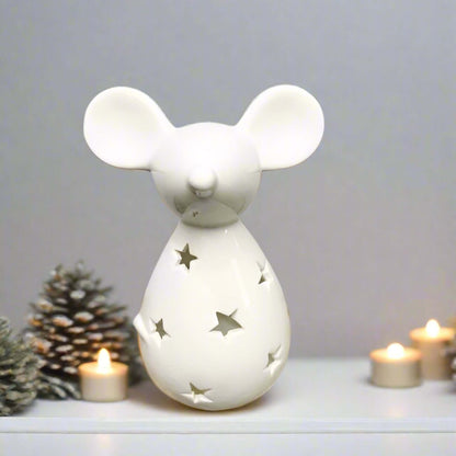 Cute and Simple Mouse Tealight Holder. Add a touch of whimsy to your holiday decor. This adorable mouse-shaped tealight holder, featuring a charming star cut-out decal and a sleek white finish, is the perfect way to bring a touch of festive cheer to your 